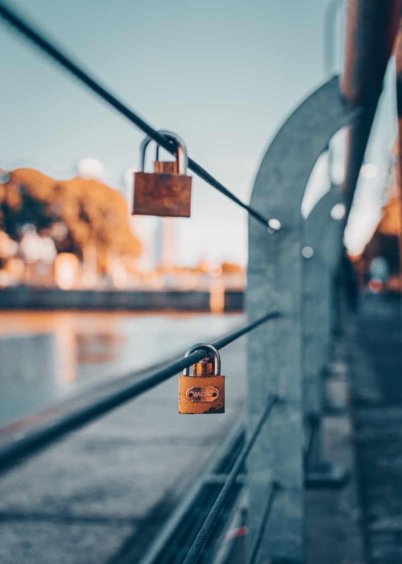 padlocks on a bridge